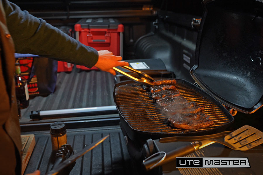 Cooking steak under a utemaster load lid 1
