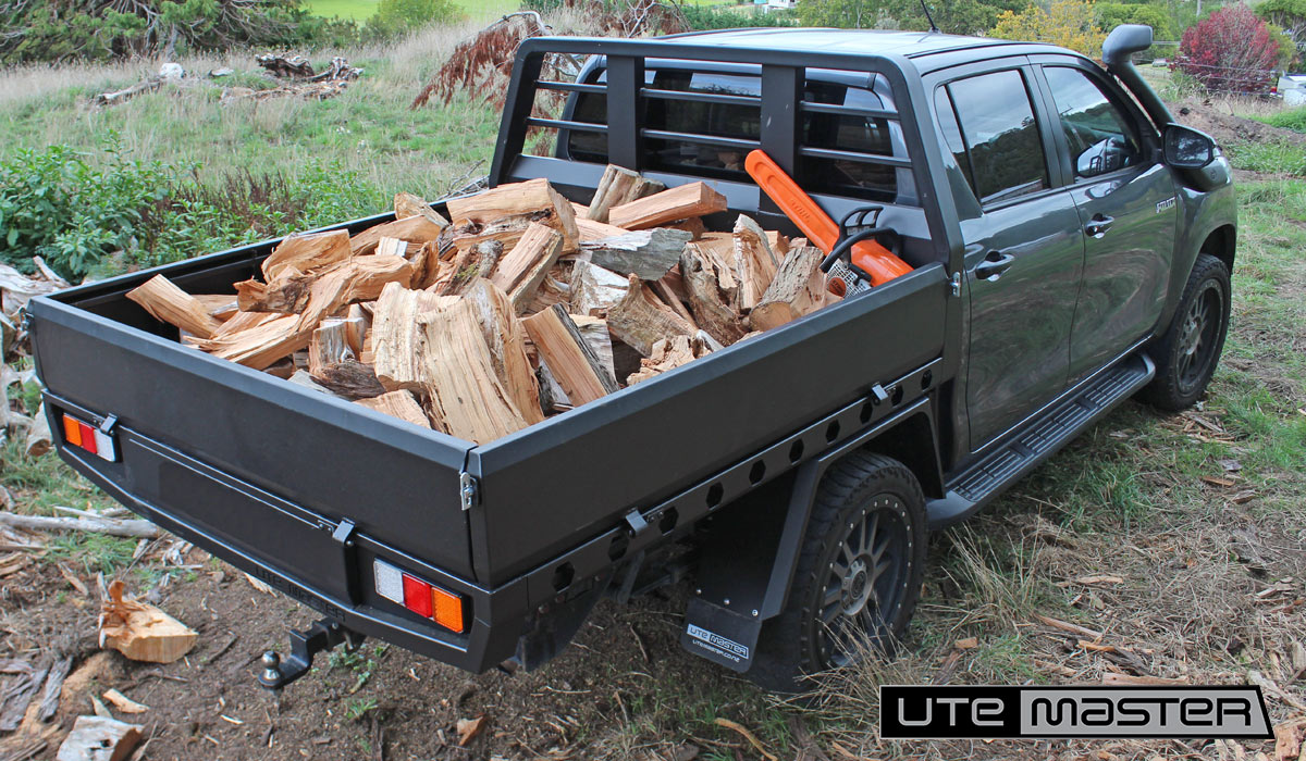 Steel Flat Deck Oasis Black Utemaster Galv Flat Deck Loaded with firewood
